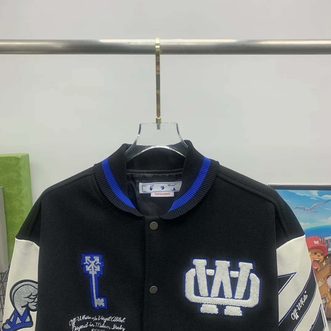 Top tested version 2023 off white heavy industry embroidery patchwork leather high temperature hot crystal diamond baseball uniform male and female couple star same style (⚠ original button mold customization, patch embroidery color matching) original packaging original label 🔍 full set of accessories customization packaging elevators are purchased from the original factory all hardware parts mold customization one-to-one restoration of fabric color components The fabric is made of 65% wool, 15% natural silk, 10% spandex and 10% velvet, mixed and custom-woven. The total weight is more than 900 grams! And the most important thing is its color fastness, it will never fade! -The embroidery uses an imported towel embroidery machine. Each pattern is first embroidered on the fabric, and then engraved with an infrared laser, and then fixed with a sewing machine. The whole garment is labeled in many places, one is flat embroidered, and the large pattern on the back is directly embroidered on it. This dress has 4 different embroidery techniques⚠ -The sleeves are all made of two-layer pebbled fabric, which is processed, shaped, colored, washed, and the texture retains the original grain structure! Thick, plump and round! -The processing technology is extremely complex, the cutting pieces are neatly aligned, and the entire garment has precise wiring density. Gender-neutral style. Loose fit, self-conscious quality control, details determine success or failure. Color: Black Size: S M L XL P: 680